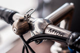 silver spur cycle bell on bike handlebars